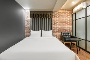 Voodi või voodid majutusasutuse Hotel Lin toas