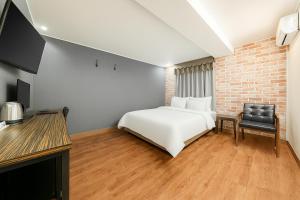 TV a/nebo společenská místnost v ubytování Hotel Lin