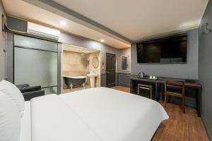 Voodi või voodid majutusasutuse Hotel Lin toas
