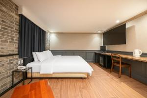 Voodi või voodid majutusasutuse Hotel Lin toas