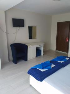 A bed or beds in a room at Exotic Guest House