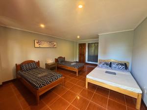 Postel nebo postele na pokoji v ubytování Cama Lodge