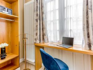 Telewizja i/lub zestaw kina domowego w obiekcie Merveil - Luxury Suite -Champs Elysees-Haussmann I