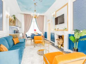 Telewizja i/lub zestaw kina domowego w obiekcie Merveil - Luxury Suite -Champs Elysees-Haussmann I
