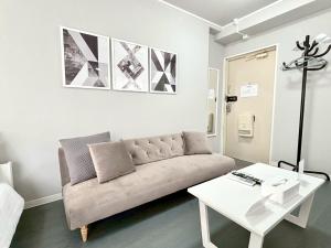 Zona de estar de Neighbor's Hotel 西十日市