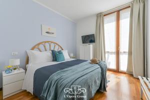 Postel nebo postele na pokoji v ubytování Méa Mare Apartment - L'Opera Group