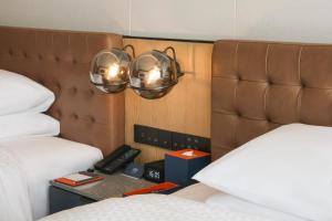 Letto o letti in una camera di Four Points by Sheraton Shenzhen, Guangming