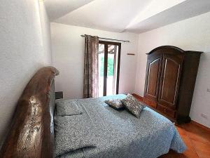 Кровать или кровати в номере Yellon House