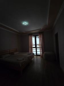 Postel nebo postele na pokoji v ubytování Mishgu Qor
