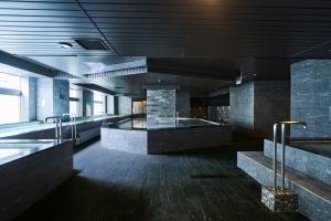 a large bathroom with a bath tub in a building at THE GLOBAL VIEW Nagasaki in Nagasaki