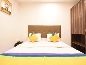 Hotel Soneva Inn客房内的一张或多张床位