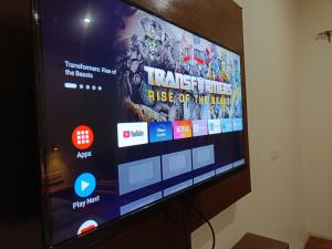 TV a/nebo společenská místnost v ubytování Apricus hotel