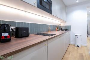Kuchyň nebo kuchyňský kout v ubytování Très Bel Appartement 4 pers Grand Théâtre