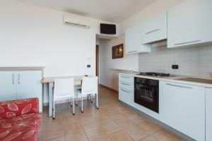 Η κουζίνα ή μικρή κουζίνα στο Dépandance HP +9 φωτογραφίες