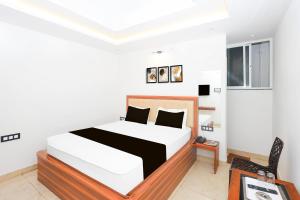 Ένα ή περισσότερα κρεβάτια σε δωμάτιο στο Super Hotel O Deluxe