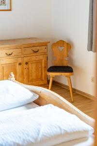 Posteľ alebo postele v izbe v ubytovaní Boutiquehotel ZOMM in Seefeld