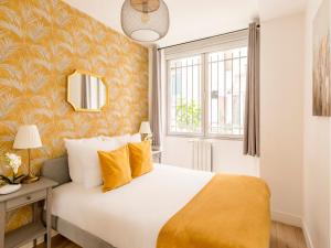 Posteľ alebo postele v izbe v ubytovaní Cozy Apartment - Louvre - Aboukir VIII
