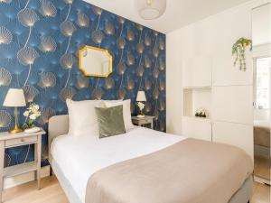 Posteľ alebo postele v izbe v ubytovaní Cozy Apartment - Louvre - Aboukir VIII
