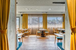 Reštaurácia alebo iné gastronomické zariadenie v ubytovaní Boutiquehotel ZOMM in Seefeld