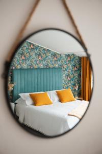 Een bed of bedden in een kamer bij Hôtel & Résidence San Roccu