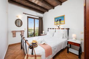 Posteľ alebo postele v izbe v ubytovaní Villa Tzina + 37 fotografií