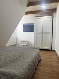 Postel nebo postele na pokoji v ubytování Apartment Lipno Hůrka