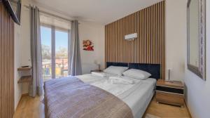 Posteľ alebo postele v izbe v ubytovaní Villa Klif, Sun & Snow