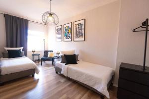 Ένα ή περισσότερα κρεβάτια σε δωμάτιο στο BetterBeds City - Apartments - Zentral - Smart TV - Küche - WLAN