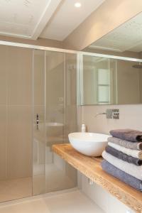 a bathroom with a sink and a shower at Villa Ghislena by salentoltremare in Marina San Gregorio +93 photos
