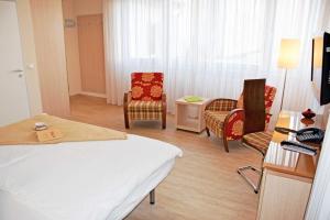Postel nebo postele na pokoji v ubytování Appartementhaus Sellin