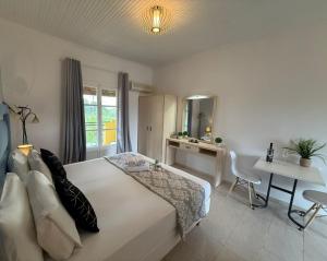Postel nebo postele na pokoji v ubytování Melitsa corfu hotel
