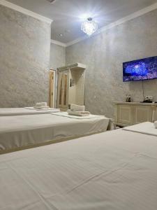 Fotografie z fotogalerie ubytování Ammar hotel v destinaci Chilanzar + 18 fotografií