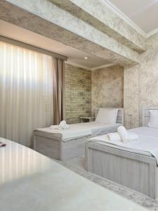 Кровать или кровати в номере Ammar hotel