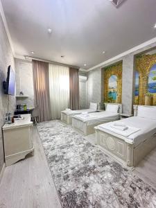 Телевизор и/или развлекательный центр в Ammar hotel