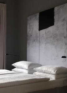 Postel nebo postele na pokoji v ubytování Strandhotel Margaretha