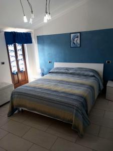 Postel nebo postele na pokoji v ubytování Casa vacanze LA TERRAZZA DEI SIBILLINI
