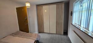 Postel nebo postele na pokoji v ubytování Homely Home