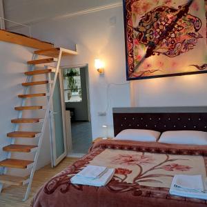 Postel nebo postele na pokoji v ubytování BIS-A Guesthouse