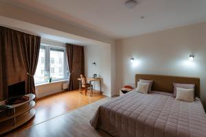 Postel nebo postele na pokoji v ubytování Villa Arus + 37 fotografií