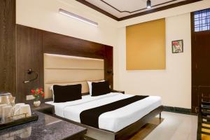 Postel nebo postele na pokoji v ubytování Hotel Max Marina Delhi Airport