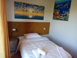 Letto o letti in una camera di Prince Hotel Fier