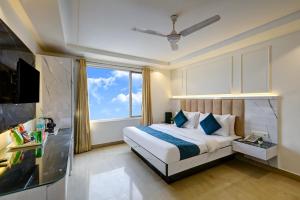 Katil atau katil-katil dalam bilik di Hotel Krishna - By RCG Hotels, Centrally Located, New Delhi