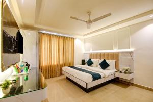 Katil atau katil-katil dalam bilik di Hotel Krishna - By RCG Hotels, Centrally Located, New Delhi