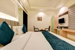 Katil atau katil-katil dalam bilik di Hotel Krishna - By RCG Hotels, Centrally Located, New Delhi