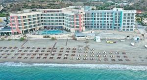 an aerial view of a hotel on the beach at Konstantinos Palace in Karpathos