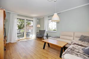 Posezení v ubytování Hermannstraße 16a Wohnung Seestern
