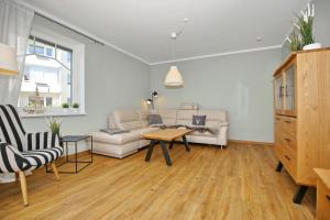 Posezení v ubytování Hermannstraße 16a Wohnung Seestern