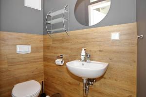 Koupelna v ubytování Hermannstraße 16a Wohnung Seestern + 13 fotografií