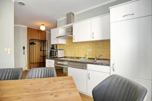 Kuchyň nebo kuchyňský kout v ubytování Hermannstraße 16a Wohnung Seestern