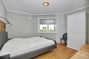 Postel nebo postele na pokoji v ubytování Hermannstraße 16a Wohnung Seestern